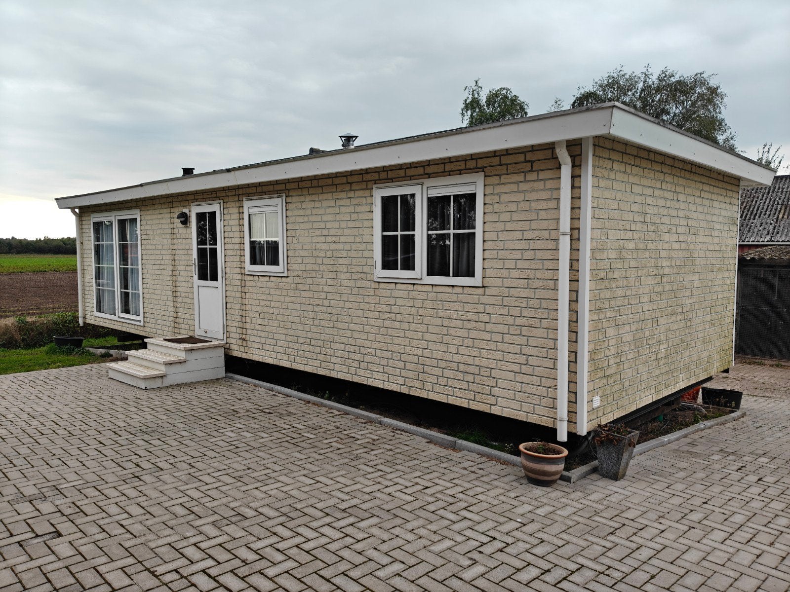 Royale Chalet 11x4 meter, luxe versie, in goede staat, Tot en met 2