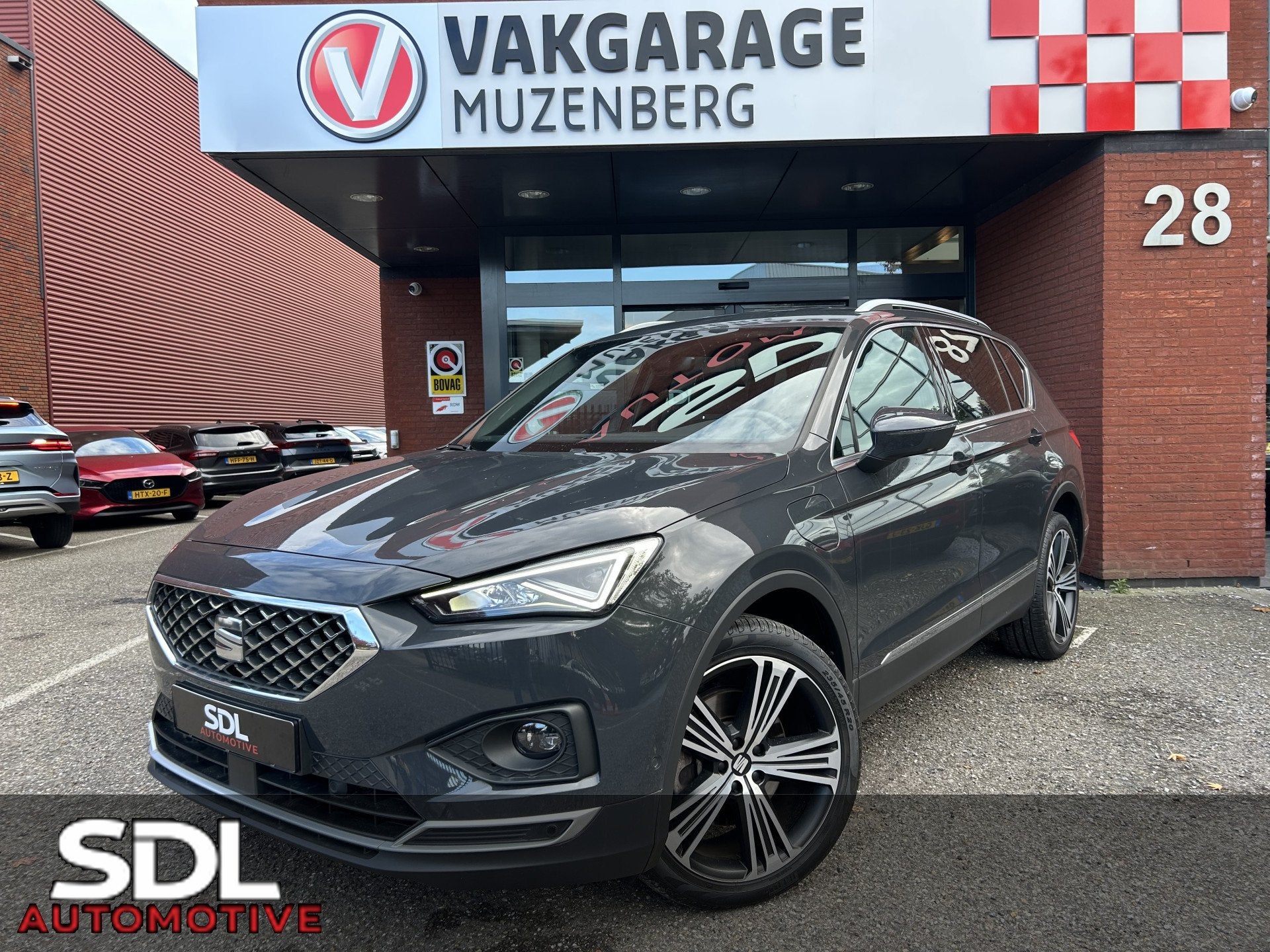 SEAT Tarraco 1.4 TSI e-Hybrid PHEV Xcellence // FULL LED //, Auto's, Gebruikt, 4 cilinders, Leder en Stof, Grijs