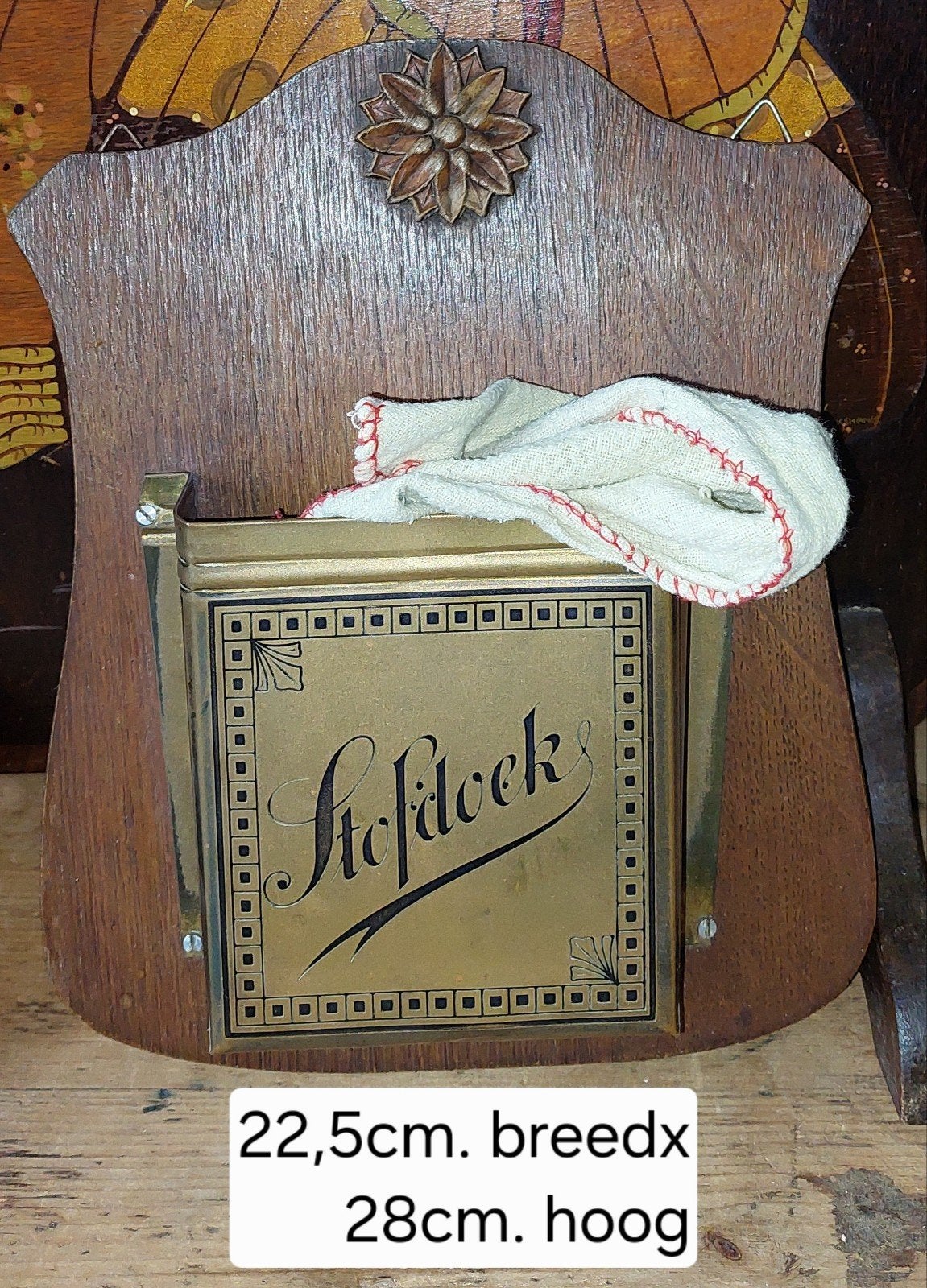 Wandhouder voor de stofdoek., Ophalen