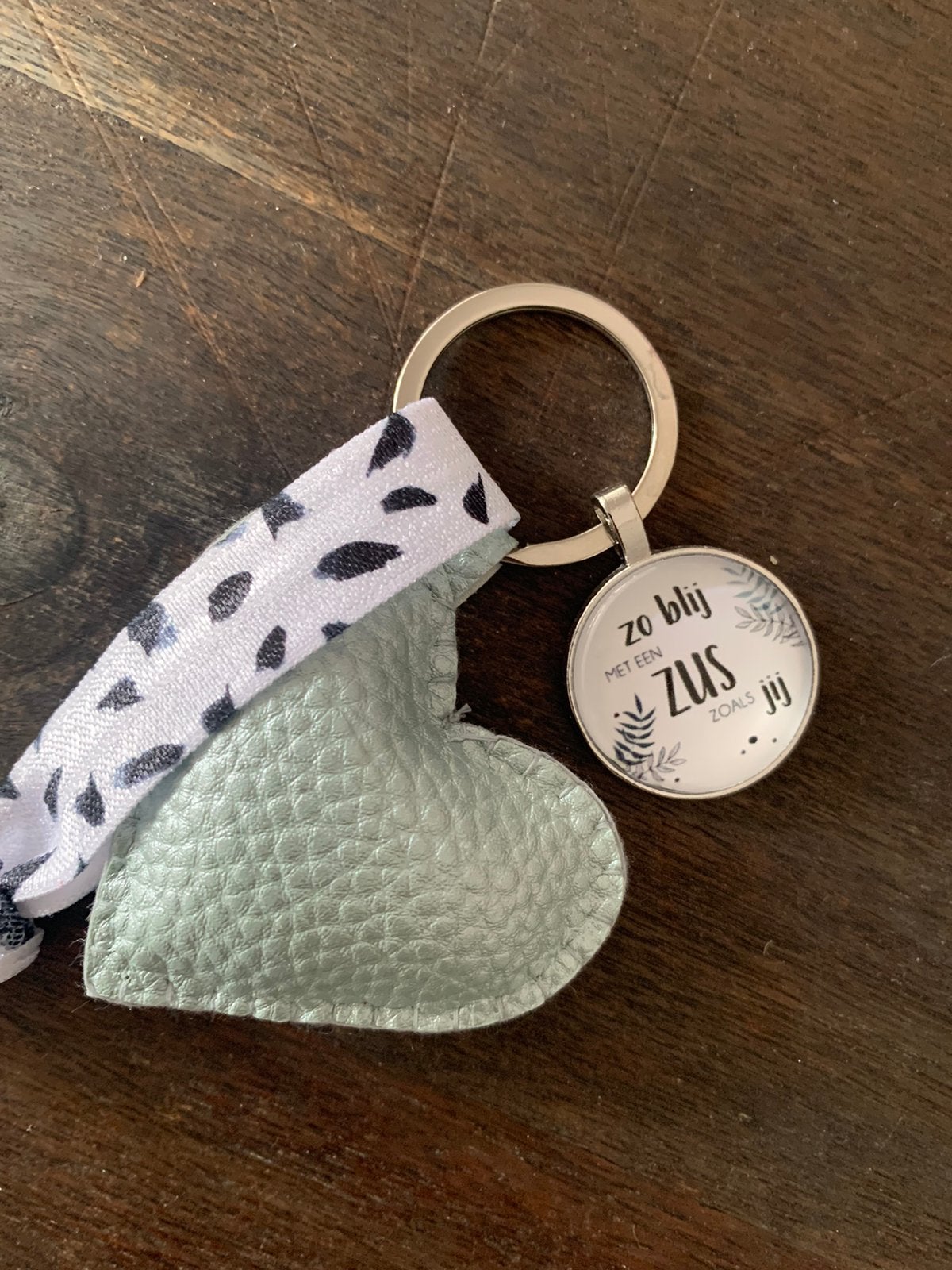 Sleutelhanger zus, Verzamelen, Ophalen of Verzenden, Nieuw