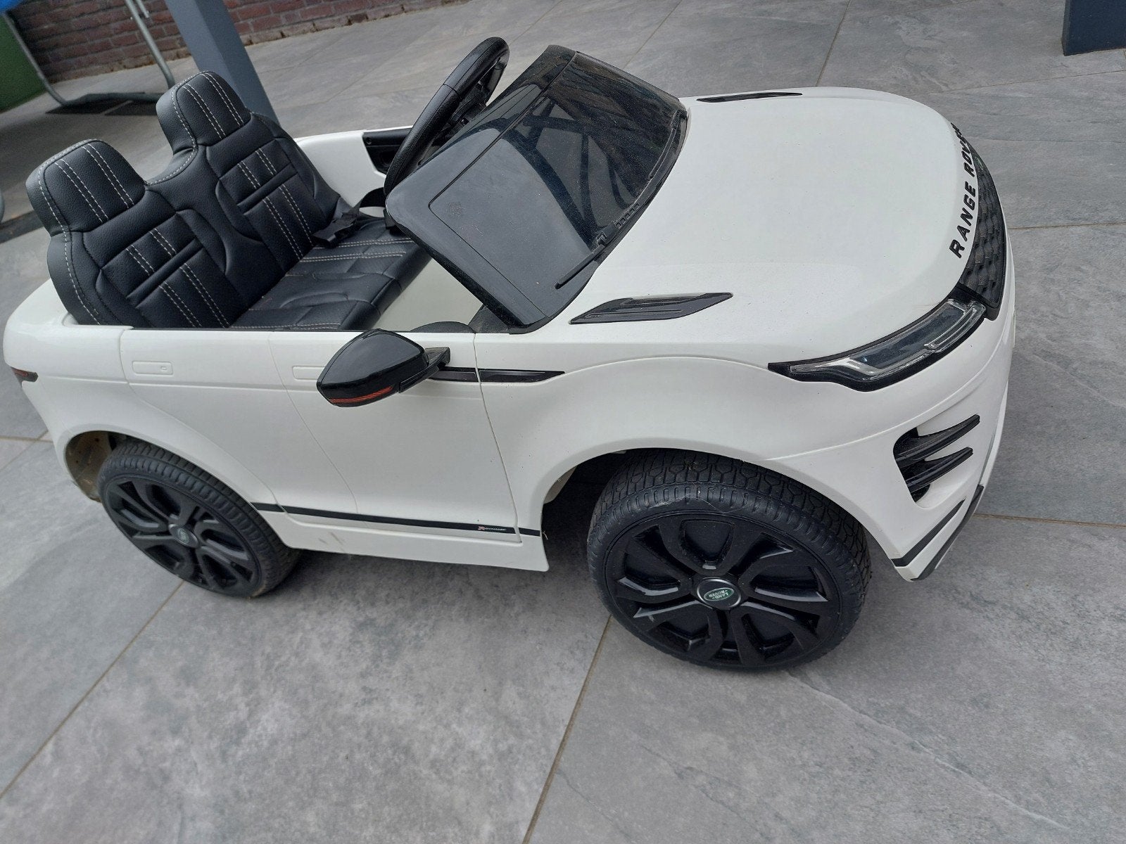 Range Rover Evoque accu kinderwagen, Ophalen