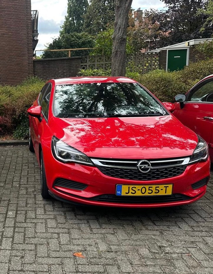 Opel Astra 1.0 Turbo 77KW 5D 2016 Rood, Auto's, Opel, Euro 6, 610 kg, 23 km/l, Origineel Nederlands