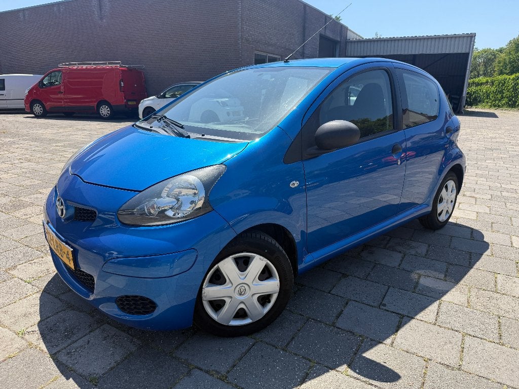 Toyota Aygo 1.0 12V Vvt-i 5DRS 2010 Blauw, Auto's, Toyota, Voorwielaandrijving, Stof, 68 pk, Origineel Nederlands