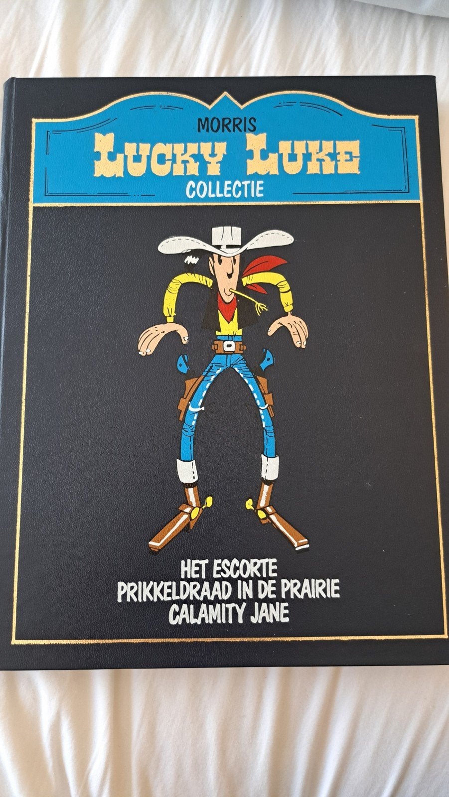Lucky Luke Collectie nr20 - Het Escorte, Eén stripboek, Ophalen of Verzenden, Zo goed als nieuw, Morris