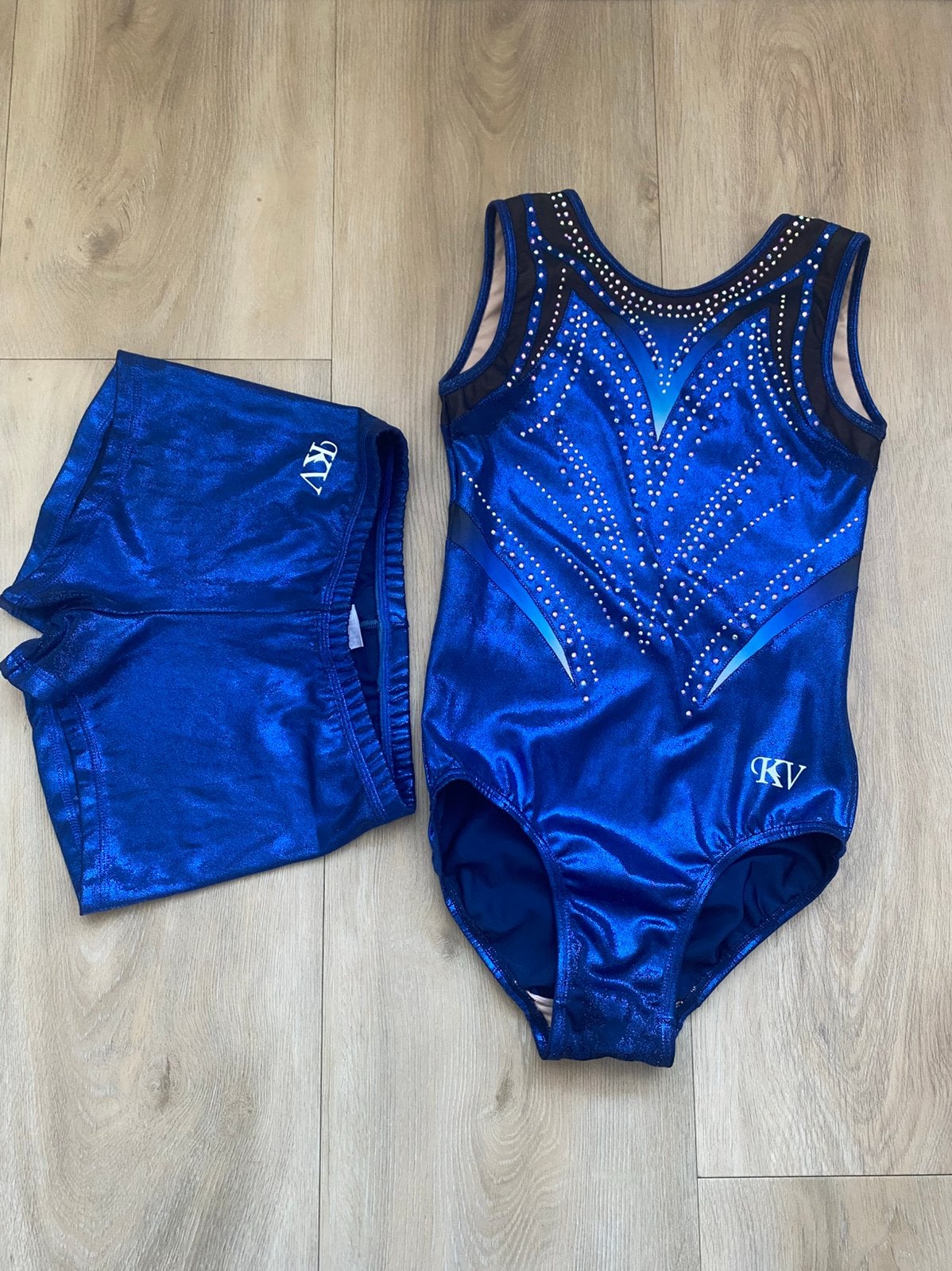Turnpakje met broekje, KV Leonards, blauw, mouwloos, maat AS, Gebruikt, Blauw, Maat 36 t/m 42, Ophalen of Verzenden