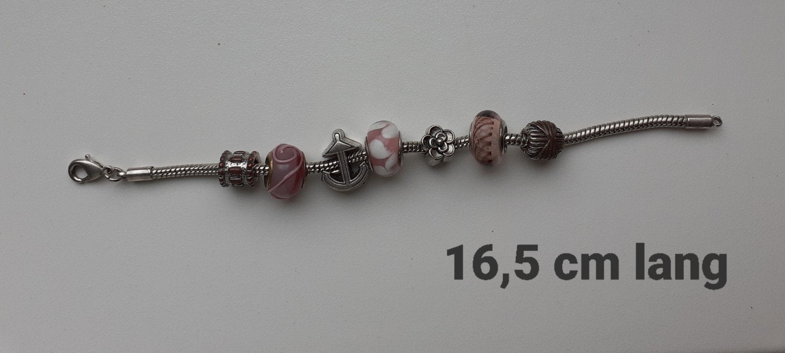 Armband, Sieraden, Tassen en Uiterlijk, Armbanden, Staal, Ophalen of Verzenden, Zo goed als nieuw, Met bedels of kralen