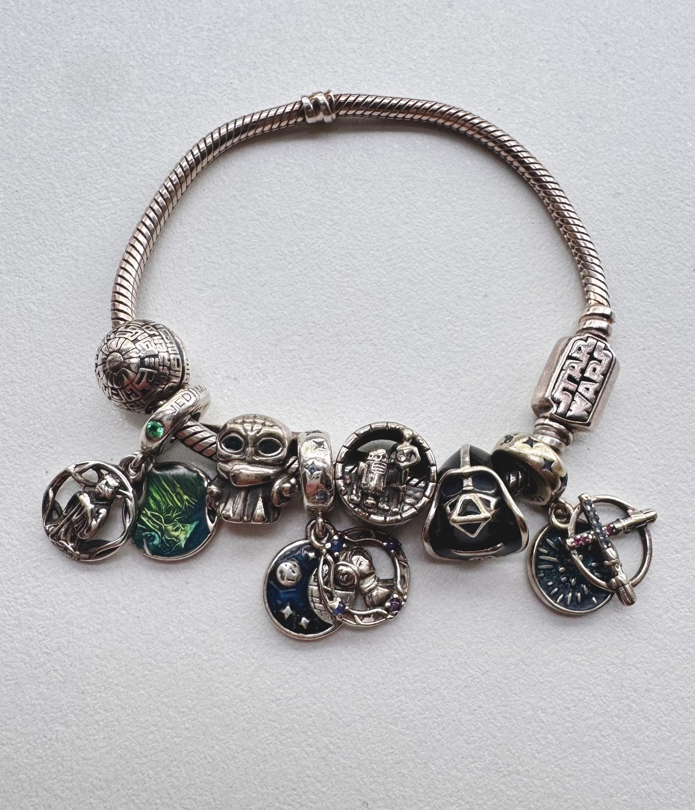 Pandora Star Wars armband met 925 zilveren bedels, Gebruikt, Pandora, Ophalen of Verzenden, 4 bedels of meer