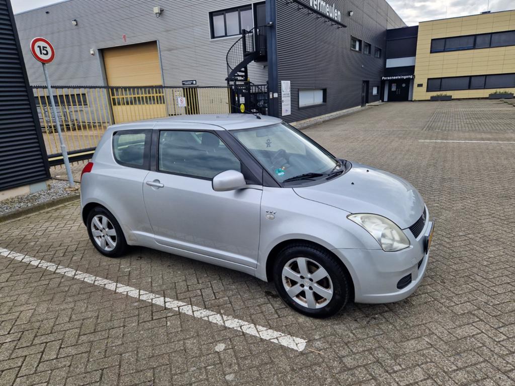 Suzuki Swift 1.3 3D 2006 Grijs, Auto's, Suzuki, Particulier, Swift, Benzine, C, Hatchback, Handgeschakeld, Geïmporteerd, Zilver of Grijs