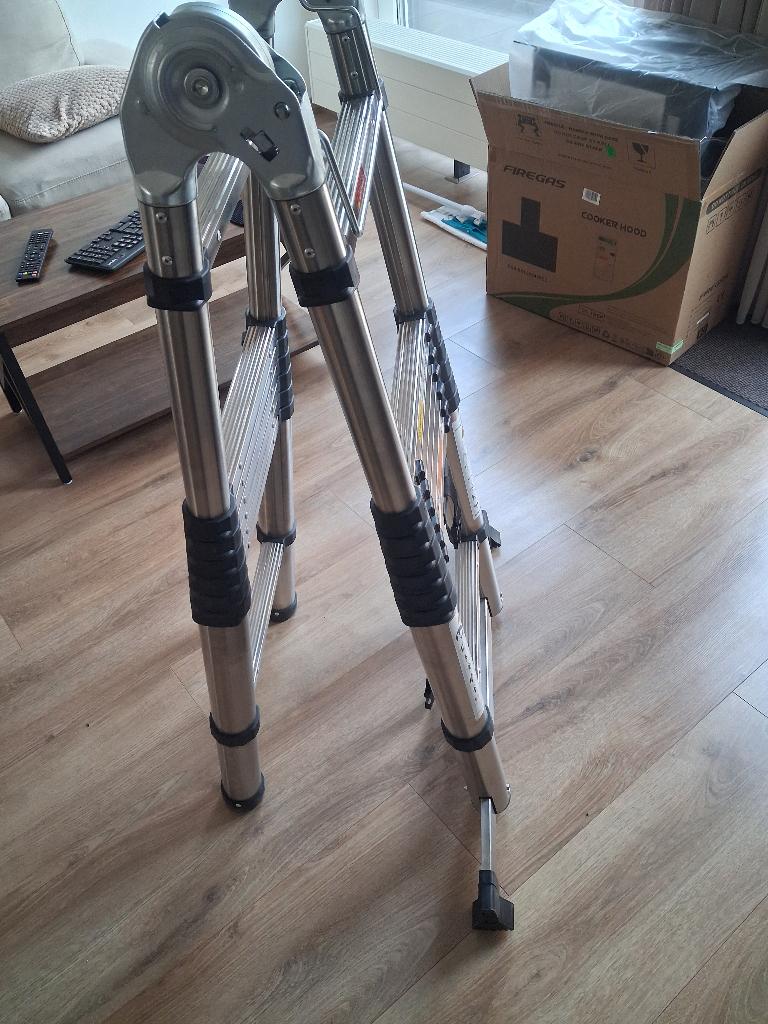 ladder splinternieuw telescopisch 5meter, Doe-het-zelf en Verbouw, Ladders en Trappen, Ophalen, Nieuw, Opvouwbaar of Inschuifbaar