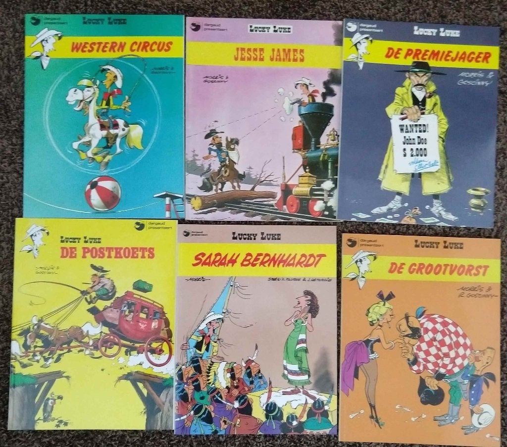Lucky Luke Stripboeken VHS-video DVD CD Hoeft niet in 1 koop, Meerdere stripboeken, Ophalen of Verzenden, Zo goed als nieuw