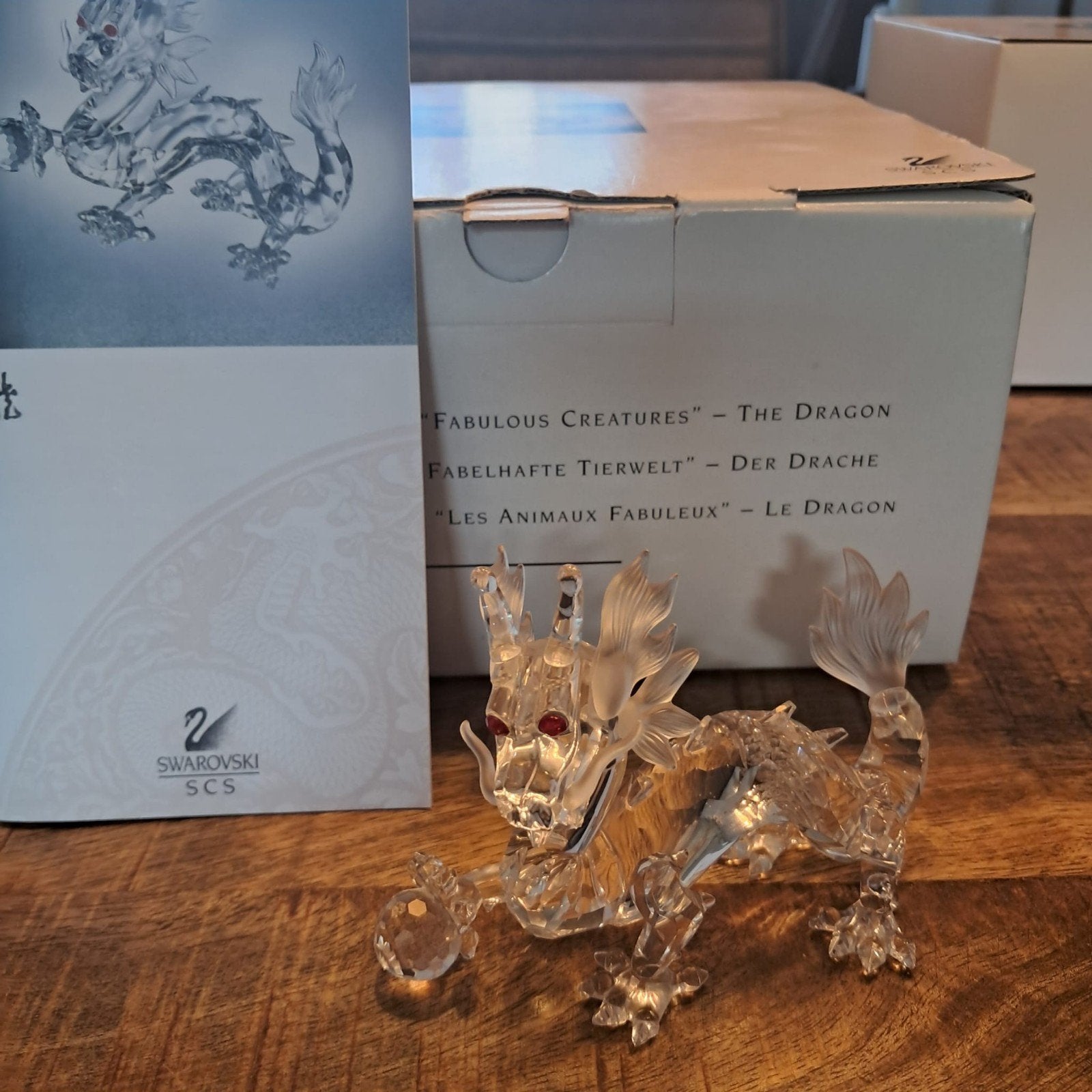 Swarovski Jaarstuk Draak met doos en certificaat, Verzamelen, Ophalen of Verzenden, Zo goed als nieuw, Figuurtje