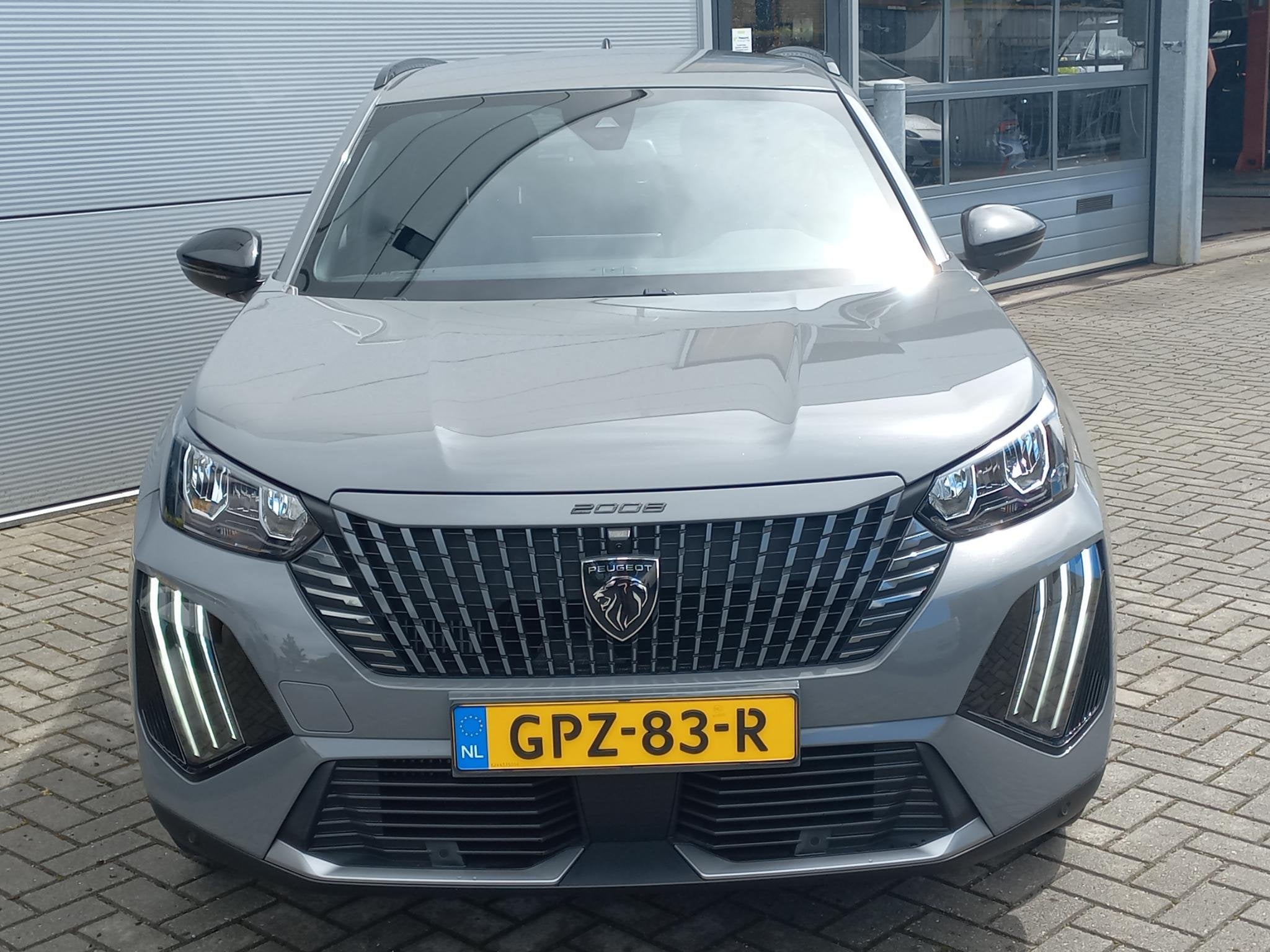 Peugeot 2008 1.2T 130pk Allure Pack Automaat | Climate contr, Auto's, Gebruikt, Euro 6, 1199 cc, Leder en Stof