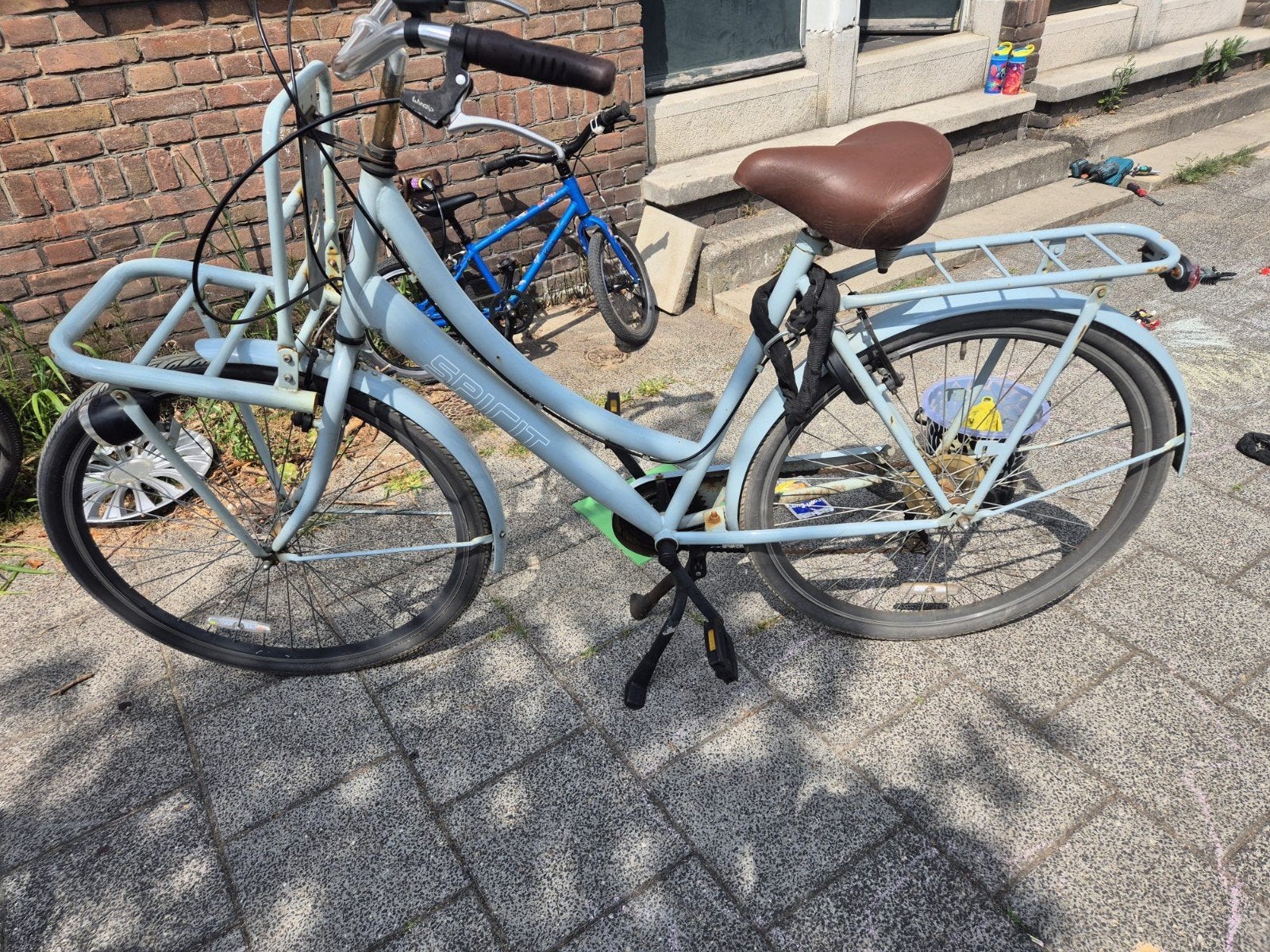 dames fiets, Ophalen