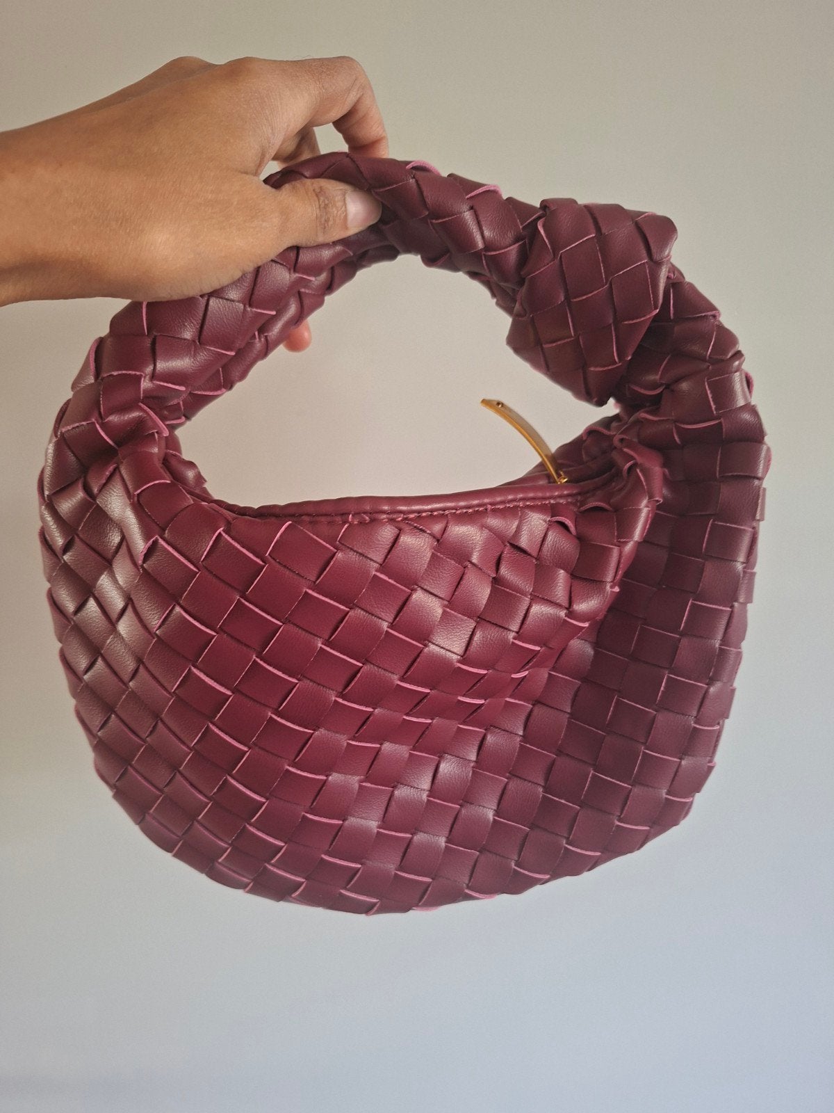 handtas bourdourrood, Ophalen
