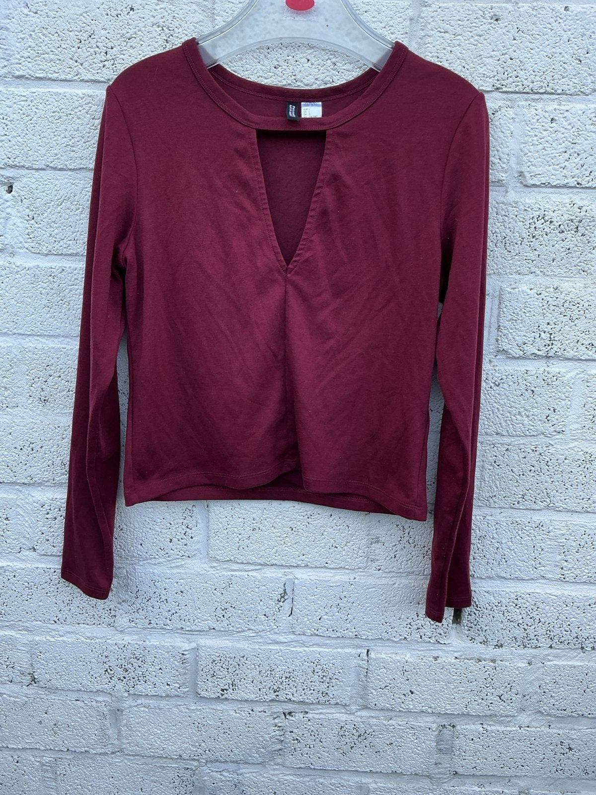 Bordeauxrode top met lange mouwen en V-hals van Divided, Kleding | Dames, Maat 42/44 (L), Ophalen of Verzenden, Lange mouw, Gedragen