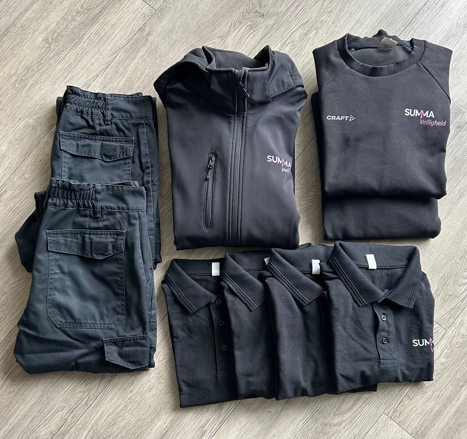 Werkkleding pakket: broeken, polo's, trui en jas, Ophalen of Verzenden, Zo goed als nieuw, Maat 48/50 (M)