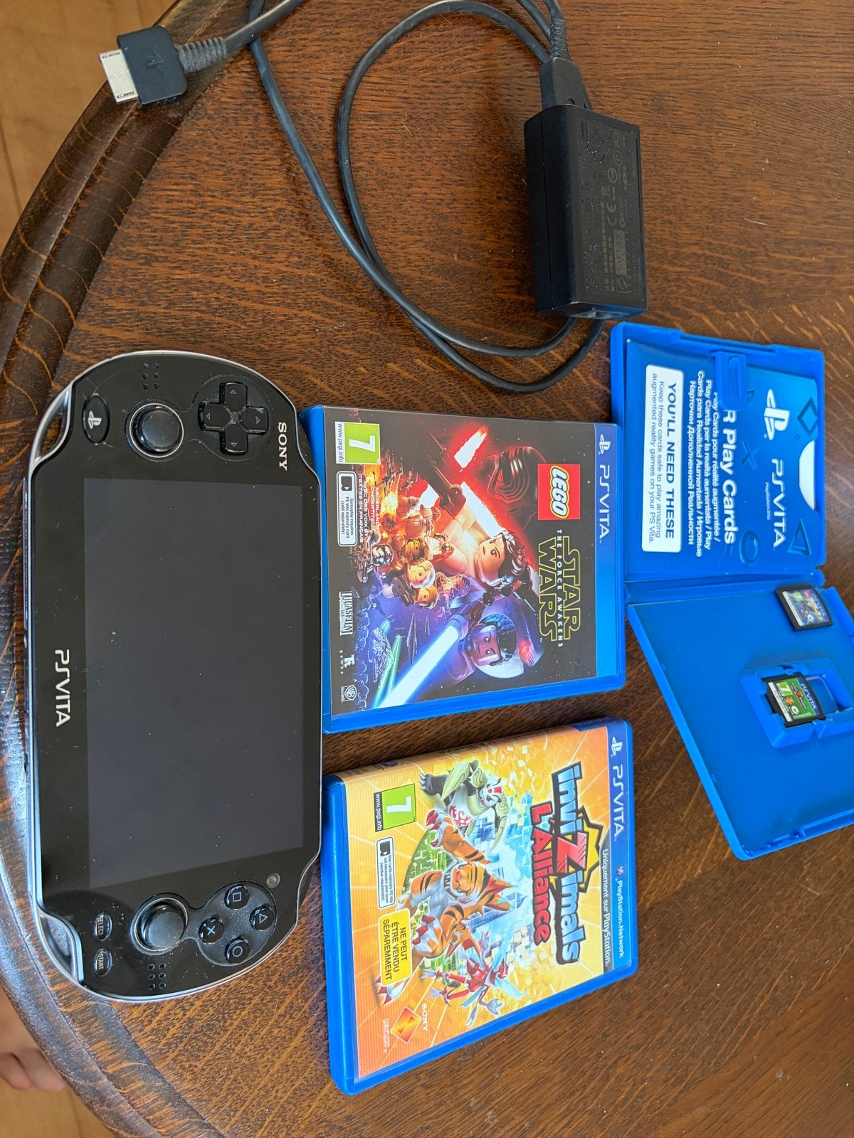 Sony PlayStation Vita PCH-1004 met 4 games, Ophalen of Verzenden, Gebruikt, Zwart, Met games