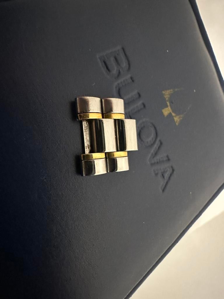 Omega Speedmaster 2x stalen gouden armband schakel, Ophalen of Verzenden, Zo goed als nieuw, Overige materialen