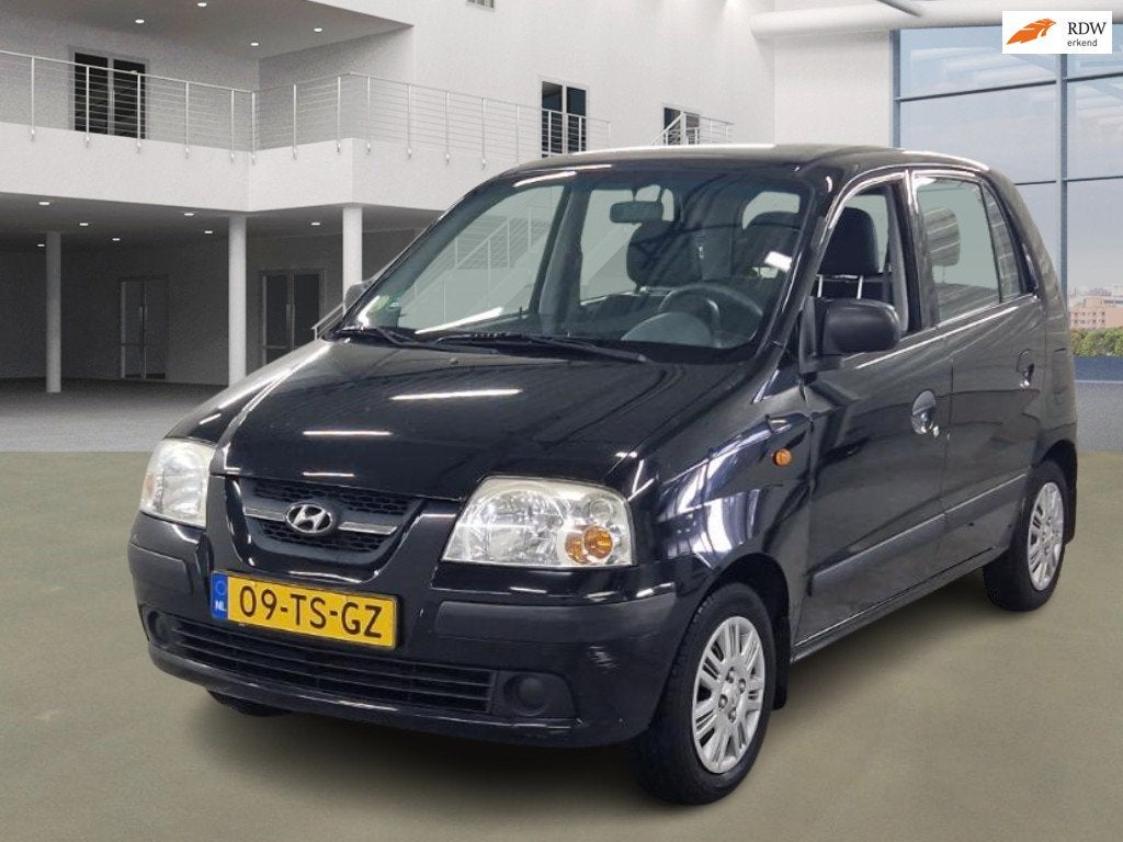 Hyundai Atos 1.1i Active Young LAGE KM|NIEUW APK |NAP|AIRCO|, Auto's, Voorwielaandrijving, 31 €/maand, 4 cilinders, Zwart