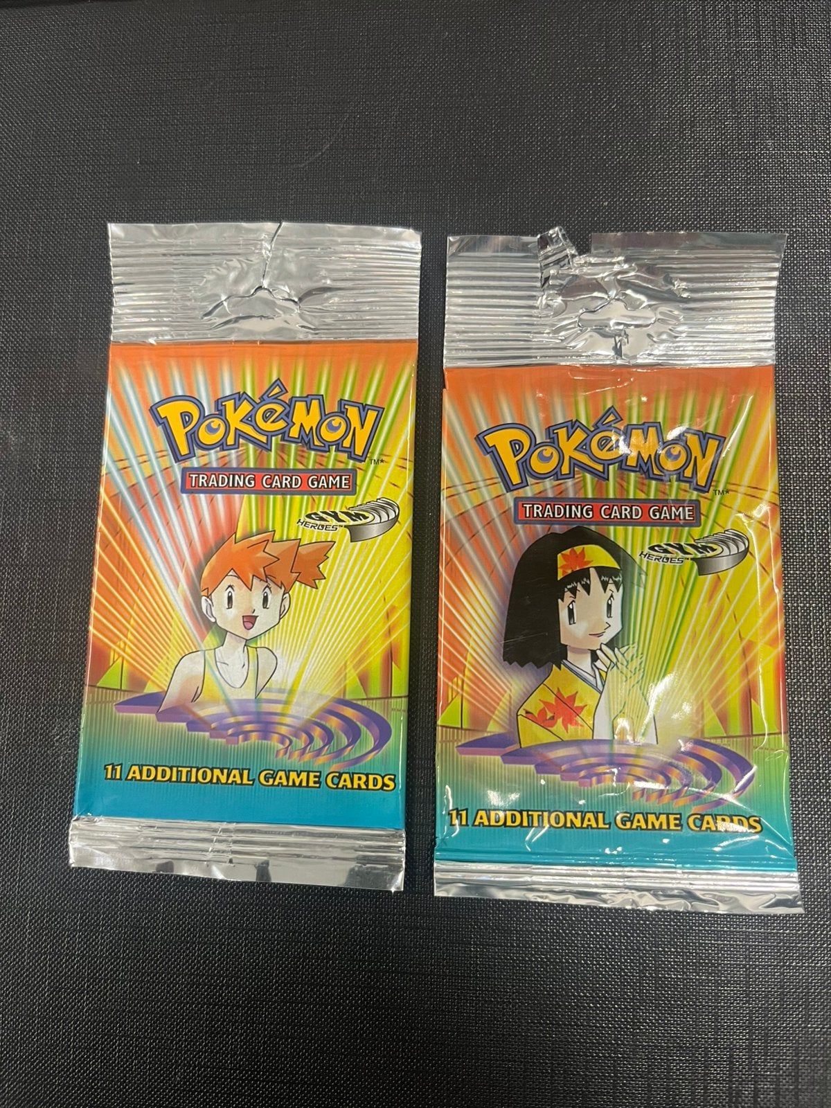 Pokemon booster empty gym heroes long crimp 2x, Ophalen of Verzenden, Zo goed als nieuw, Booster