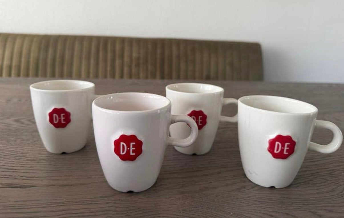 Douwe Egberts Koffie kopjes, Ophalen of Verzenden, Zo goed als nieuw, Overige stijlen, Kop(pen) en/of Schotel(s)