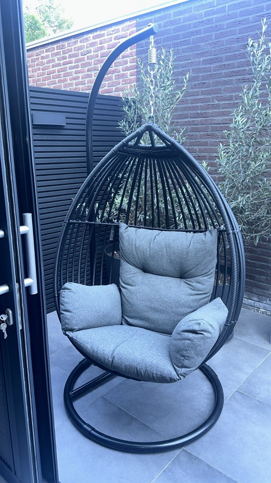 Comfortabele hangstoel met kussen in goede staat, Ophalen of Verzenden, Zo goed als nieuw, Wicker