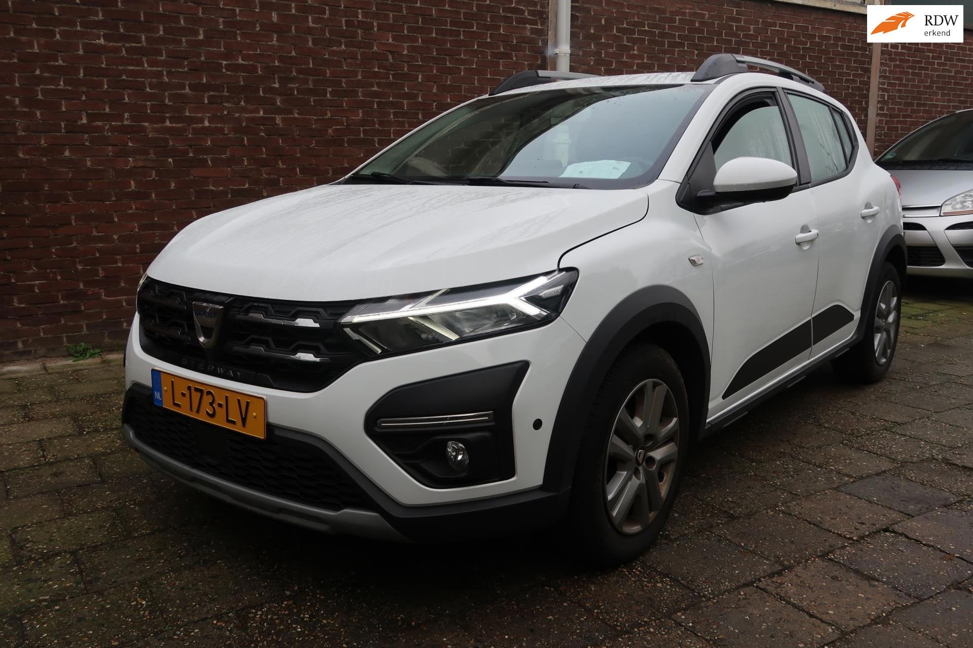 Dacia Sandero Stepway 1.0 TCe 100 Bi-Fuel Comfort *Rijklaarp, Auto's, Dealer onderhouden, Stof, 610 kg, Wit