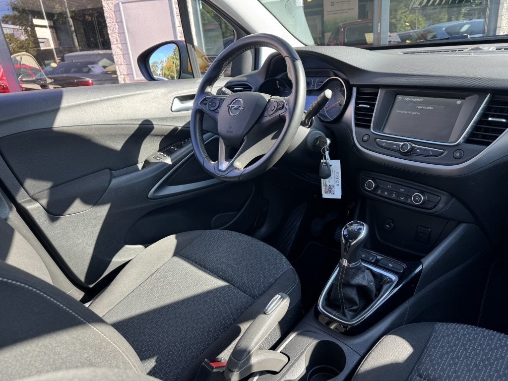 Opel Crossland X 1.2 Edition Trekhaak Navi Carplay Weinig KM, Auto's, 1063 kg, Gebruikt, Euro 6, 1199 cc