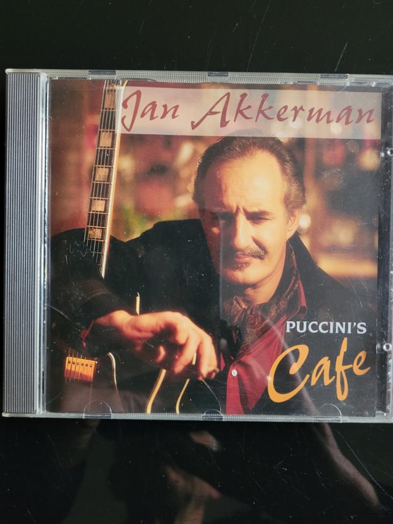 Jan Akkerman - Puccini's Cafe CD, Cd's en Dvd's, Cd's | Overige Cd's, Ophalen of Verzenden, Gebruikt