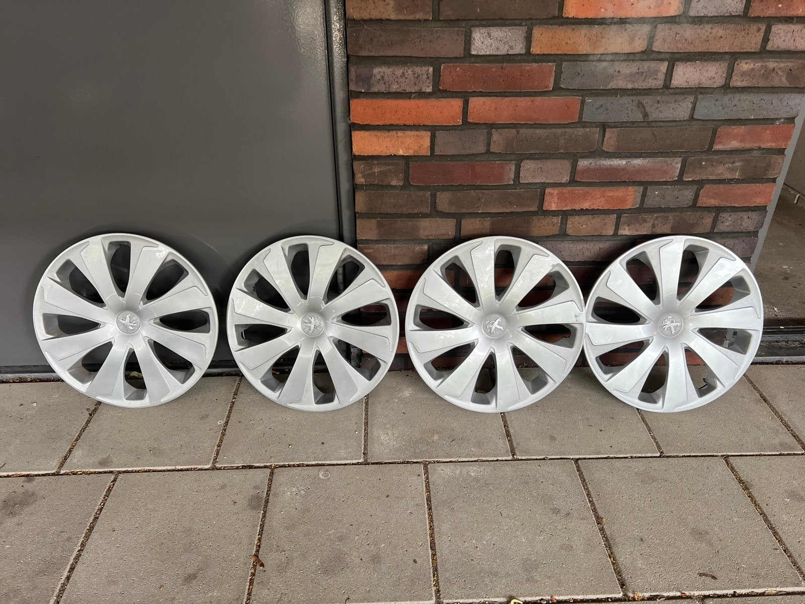 Set van 4 wieldoppen 14 inch. Peugeot 108, Ophalen of Verzenden, Zo goed als nieuw