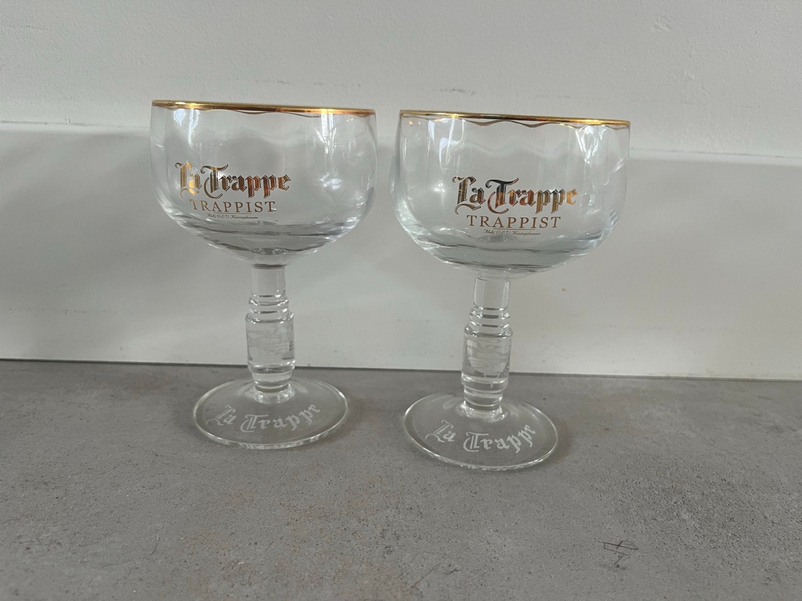 Set van 2 La Trappe Trappist bierglazen met gouden rand, Ophalen of Verzenden