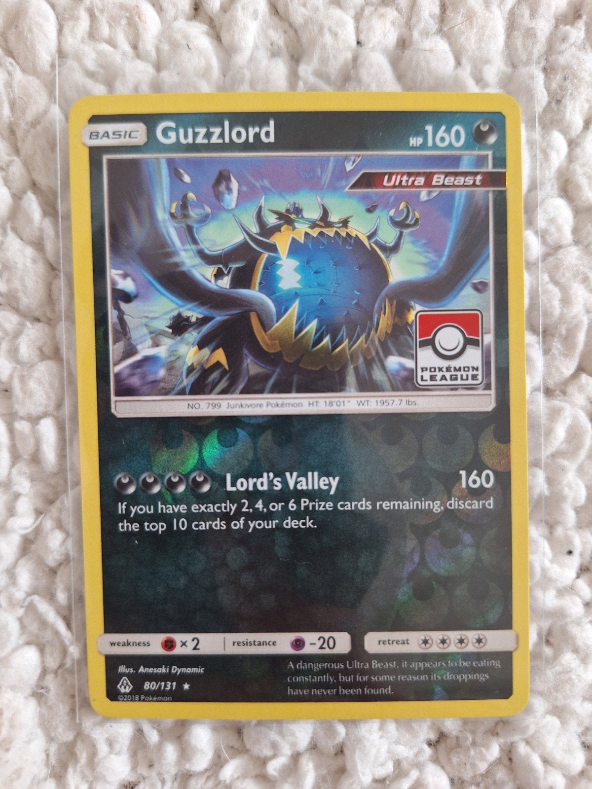 Pokémon Guzzlord Holo 80/131 forbidden light stamped, Ophalen of Verzenden, Nieuw