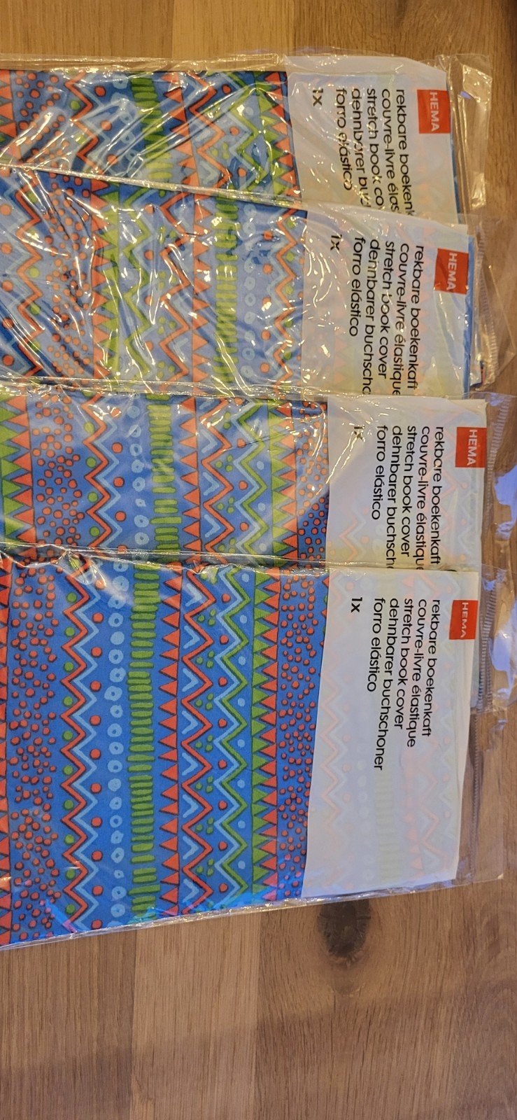 4 nieuwe rekbare boekenkaften hema, Ophalen of Verzenden, Nieuw