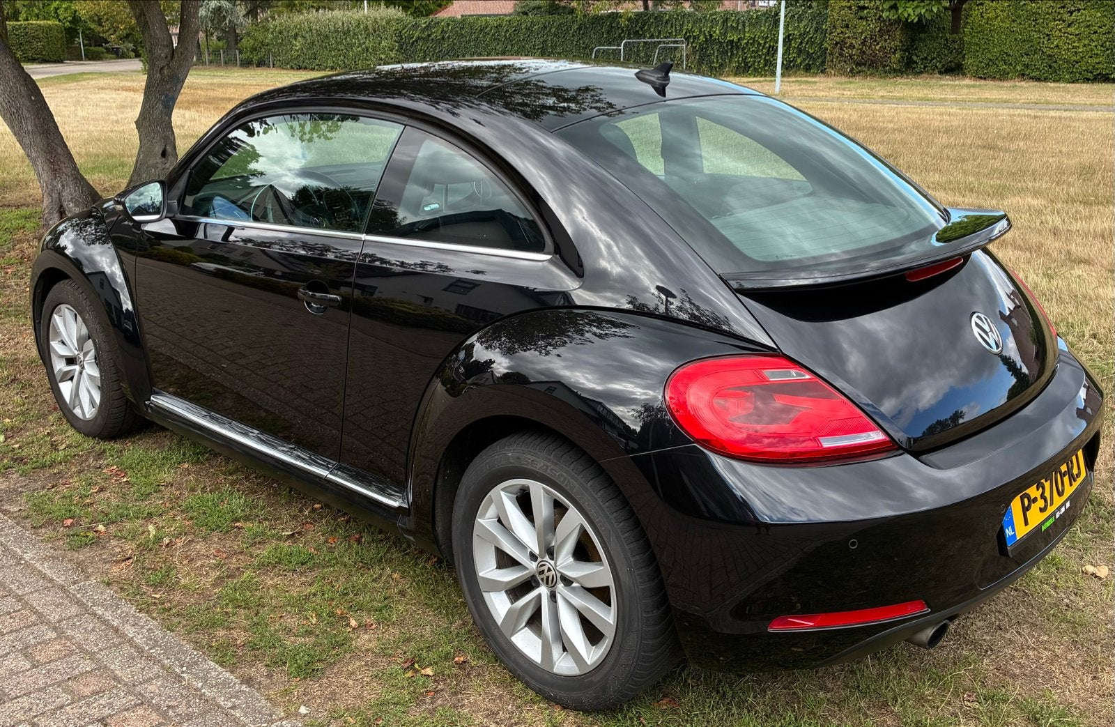 Volkswagen Beetle (Kever) 1.2 TSI 77KW  2012 Zwart, Auto's, Voorwielaandrijving, Stof, 4 cilinders, 4 stoelen