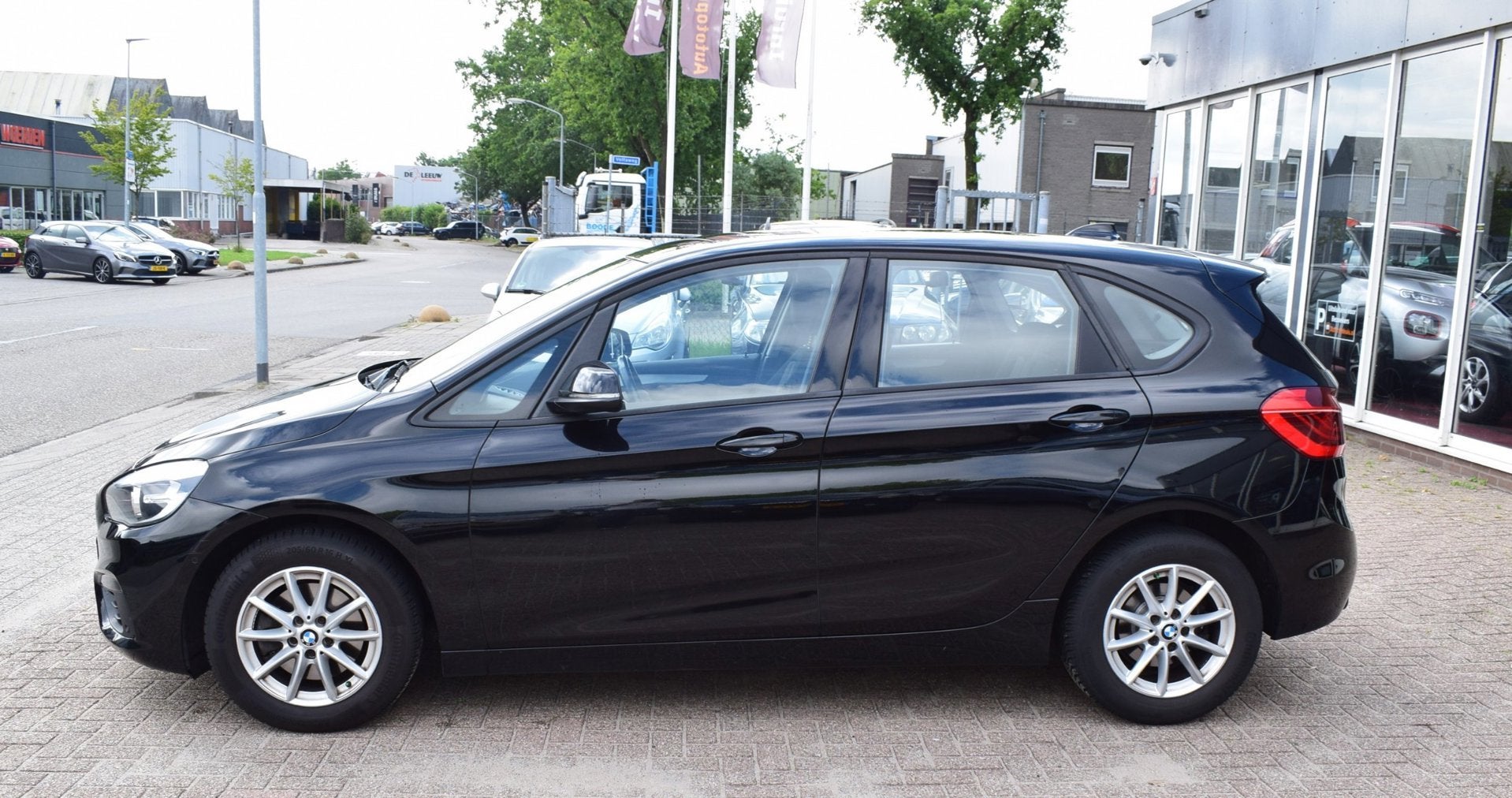 BMW 2-serie Active Tourer 218i Centennial High Executive |AU, Auto's, 1345 kg, Gebruikt, Automatische klimaatregeling, Zwart