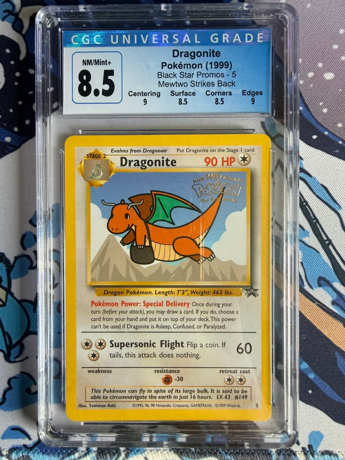 Pokémon Dragonite #5 WB Promo 1999 CGC 8.5 Black Star, Ophalen of Verzenden, Zo goed als nieuw