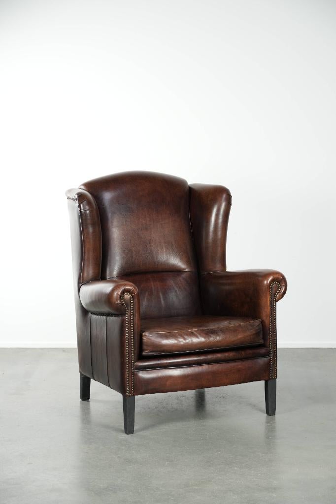 Grote en comfortabele schapenleren oorfauteuil, Huis en Inrichting, Fauteuils, Gebruikt, Leer, 75 tot 100 cm, 75 tot 100 cm, Ophalen