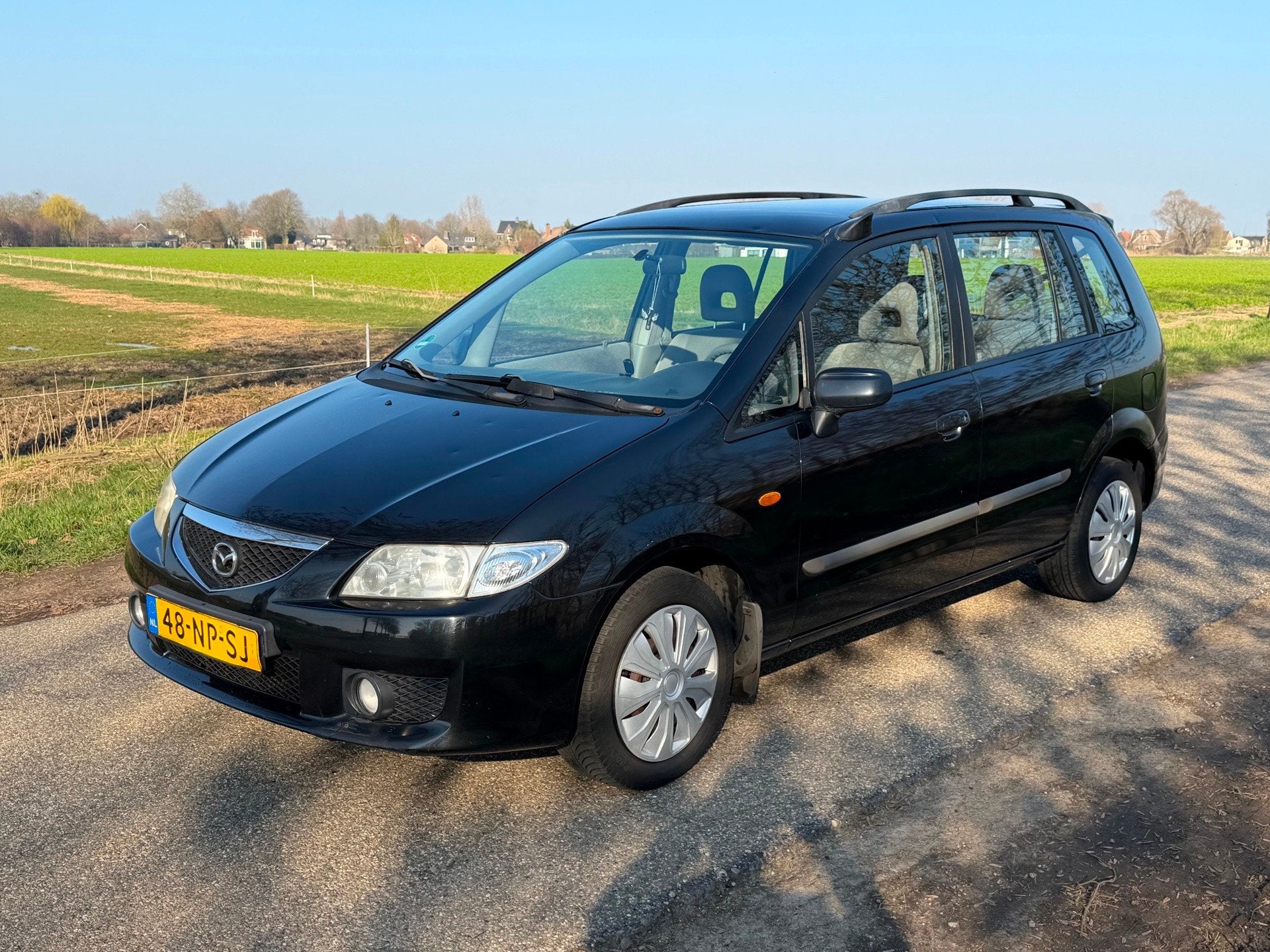 Mazda Premacy 2.0i Active Airco NAP APK 03-2027, Auto's, Stof, Gebruikt, Zwart, 4 cilinders