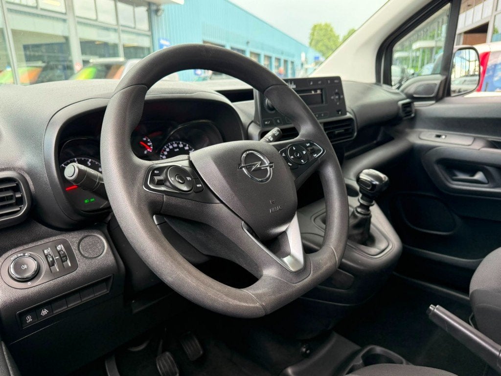 Opel COMBO 1.2 TOUR AIRCO 5PERS CRUISECONTROL 2xSCHUIFDEUR., Auto's, Opel, Gebruikt, Overige modellen, Wit, Bedrijf
