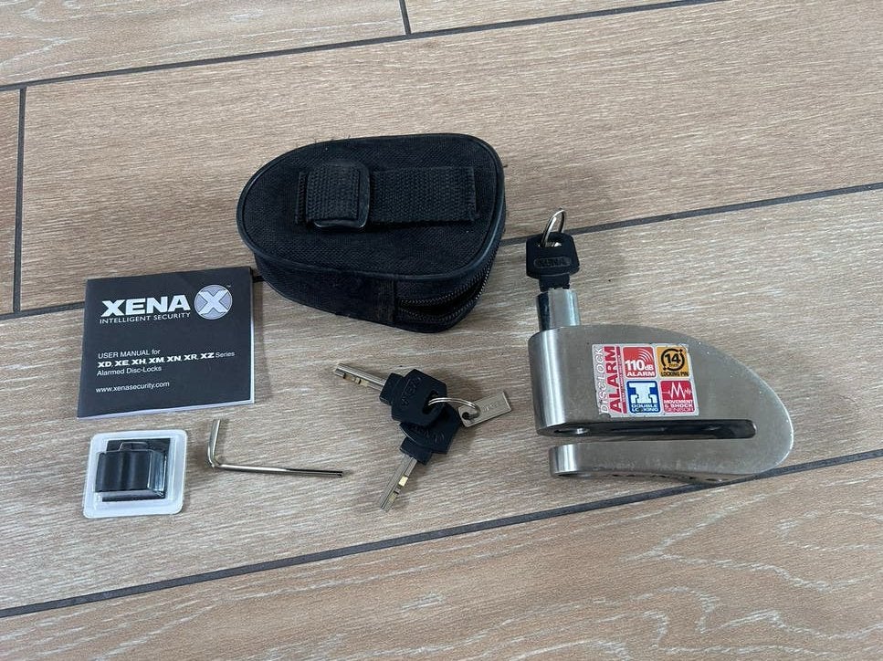 Xena Disc Lock Alarm 110dB - Motorfiets schijfremslot, Motoren, Accessoires | Sloten, Ophalen of Verzenden, Gebruikt