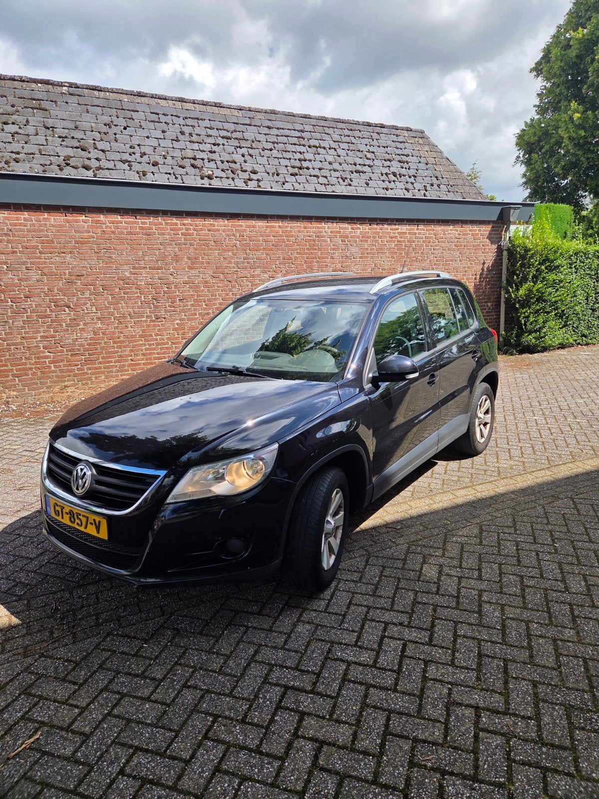 Volkswagen Tiguan 1.4 TSI, Android Auto, trekhaak, 4 cilinders, 2000 kg, Zwart, Stoelverwarming