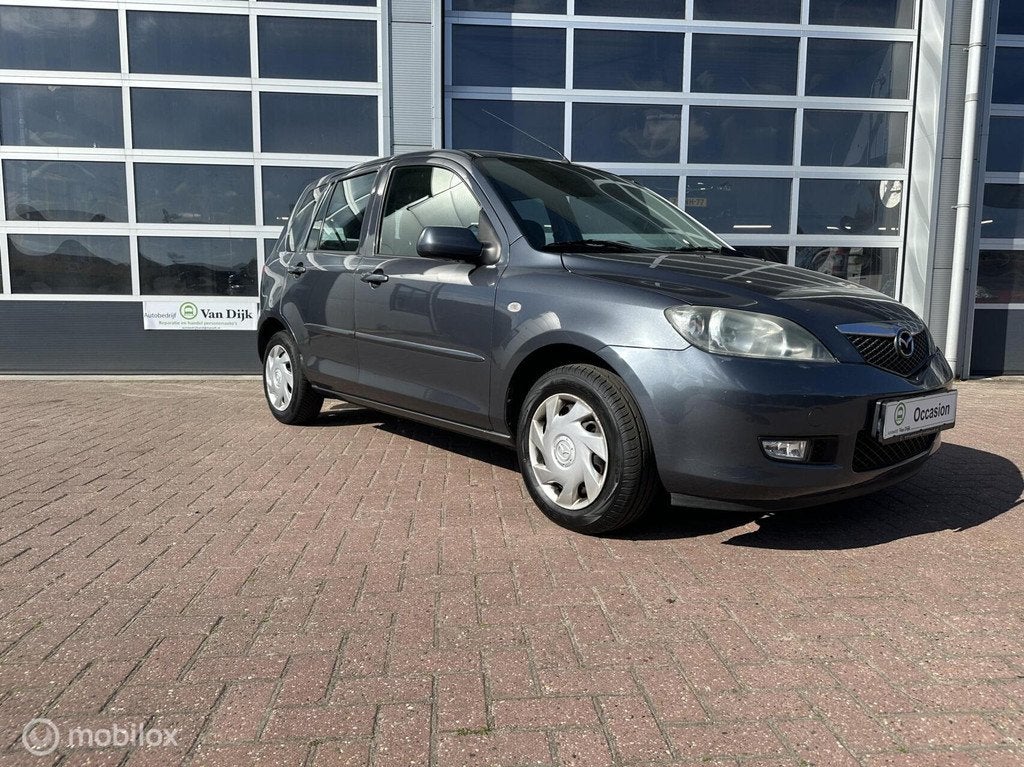 Mazda 2 1.4 Touring met trekhaak en airco, Auto's, Mazda, Voorwielaandrijving, 40 €/maand, 4 cilinders, Elektrische ramen