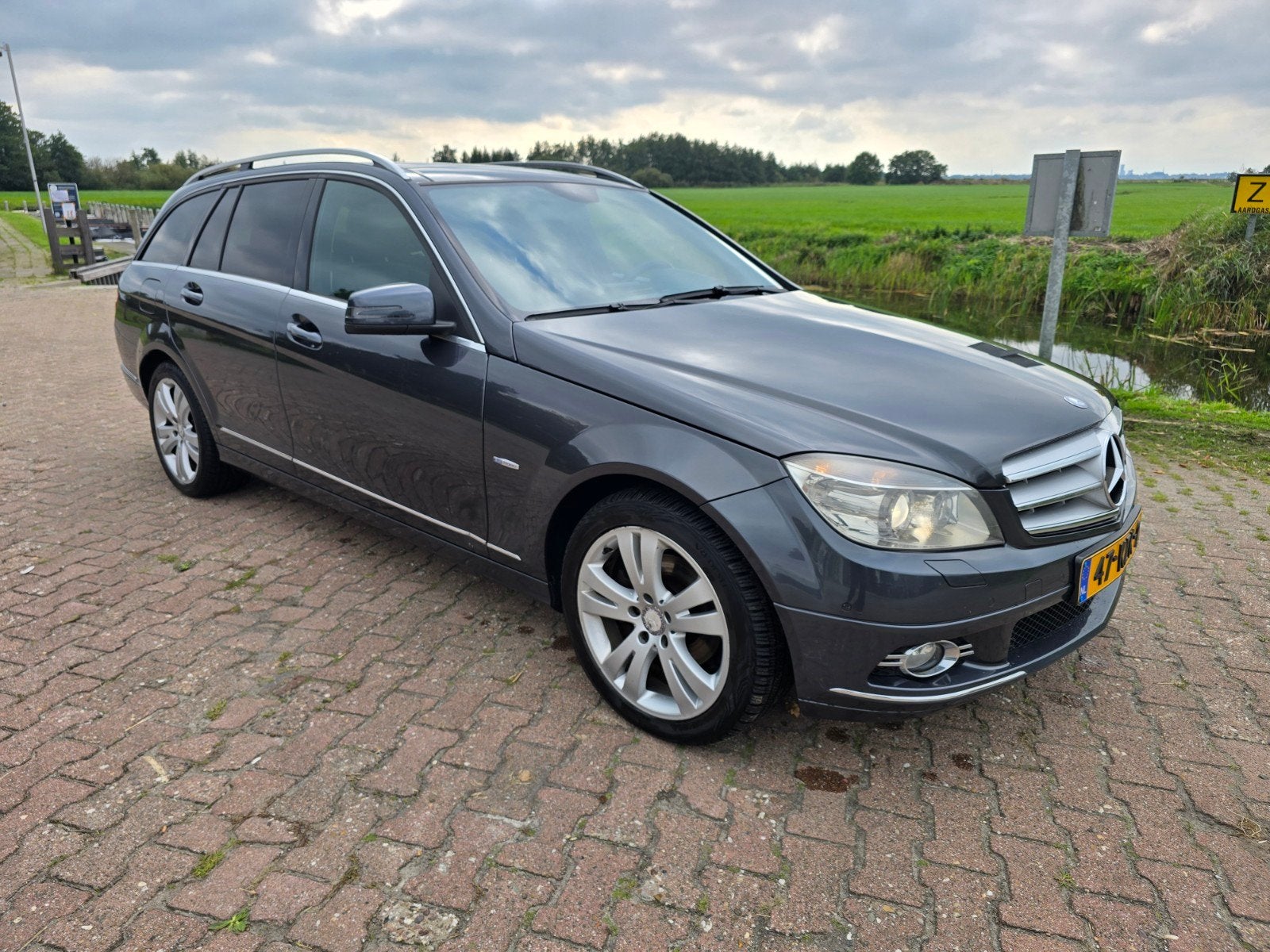 Mercedes-Benz C-Klasse 2.2 CDI C200 Estate AUT 2010 Grijs, Automaat, Dealer onderhouden, 1800 kg, Zwart