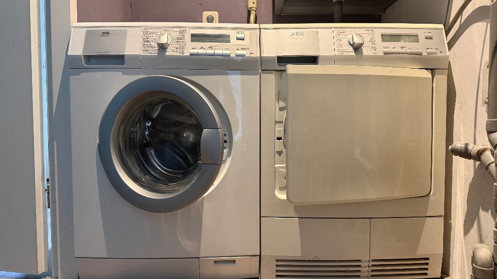 AEG wasmachine + warmtepompdroger, 6 tot 8 kg, Ophalen, Gebruikt, 85 tot 90 cm
