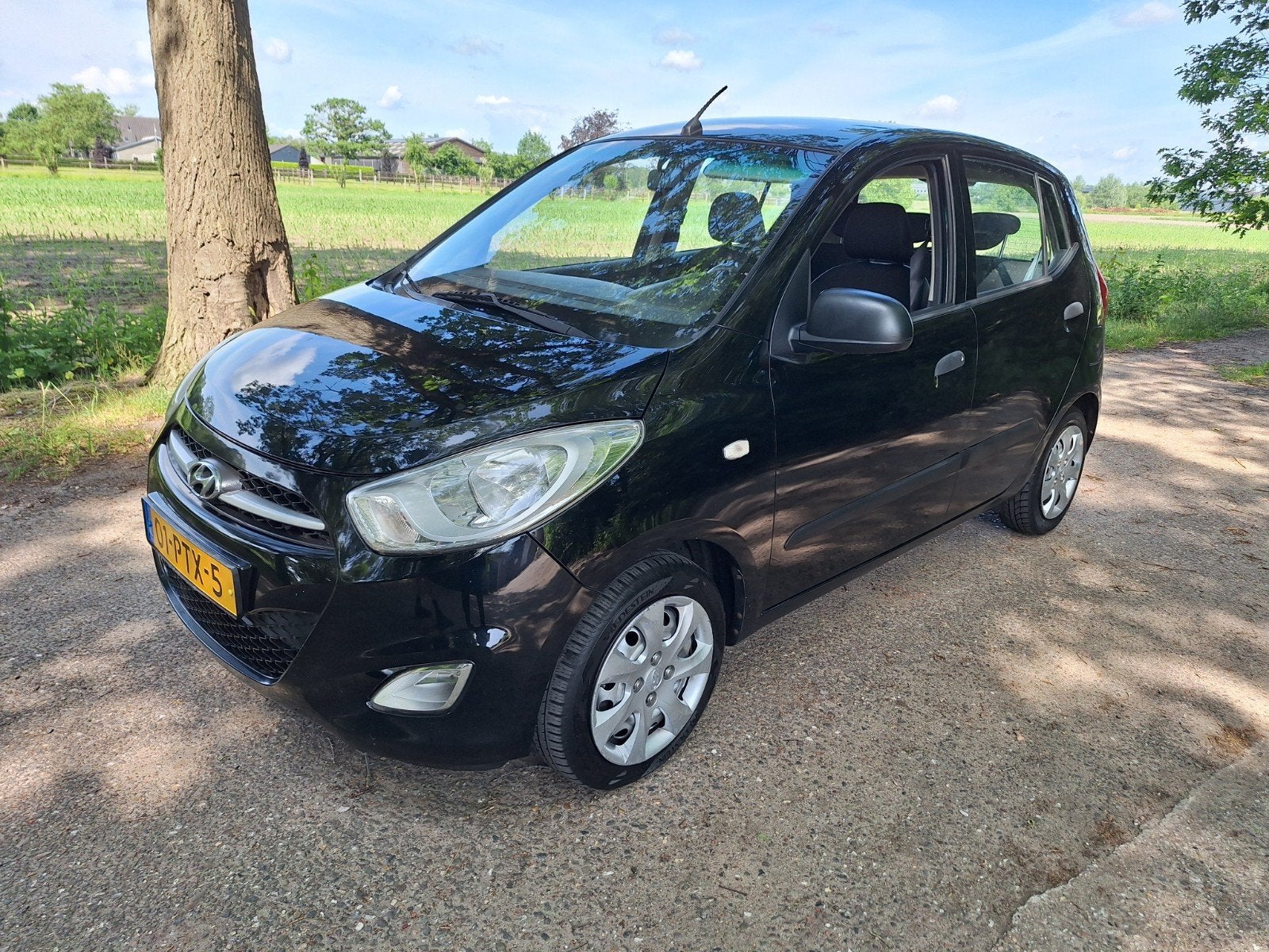 Hyundai i10 1.1 I 5DR 2011 apk 11-26 Zwart vr.pr. 1850, Auto's, Stof, 4 cilinders, 400 kg, Zwart