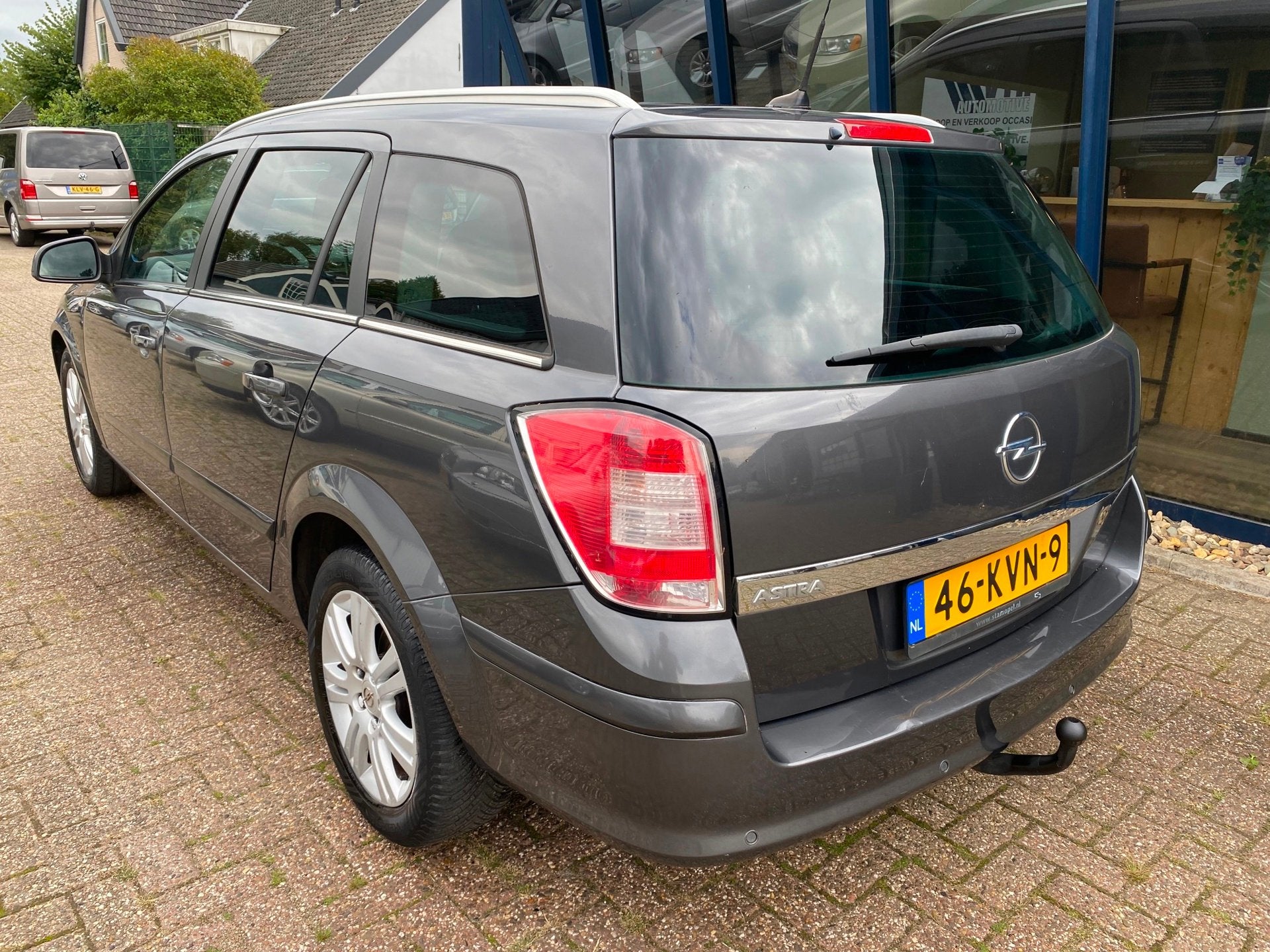 Opel Astra Wagon 1.6 Cosmo LEER / NAVI / TREKHAAK, Auto's, Opel, Voorwielaandrijving, Dealer onderhouden, 15 km/l, Gebruikt