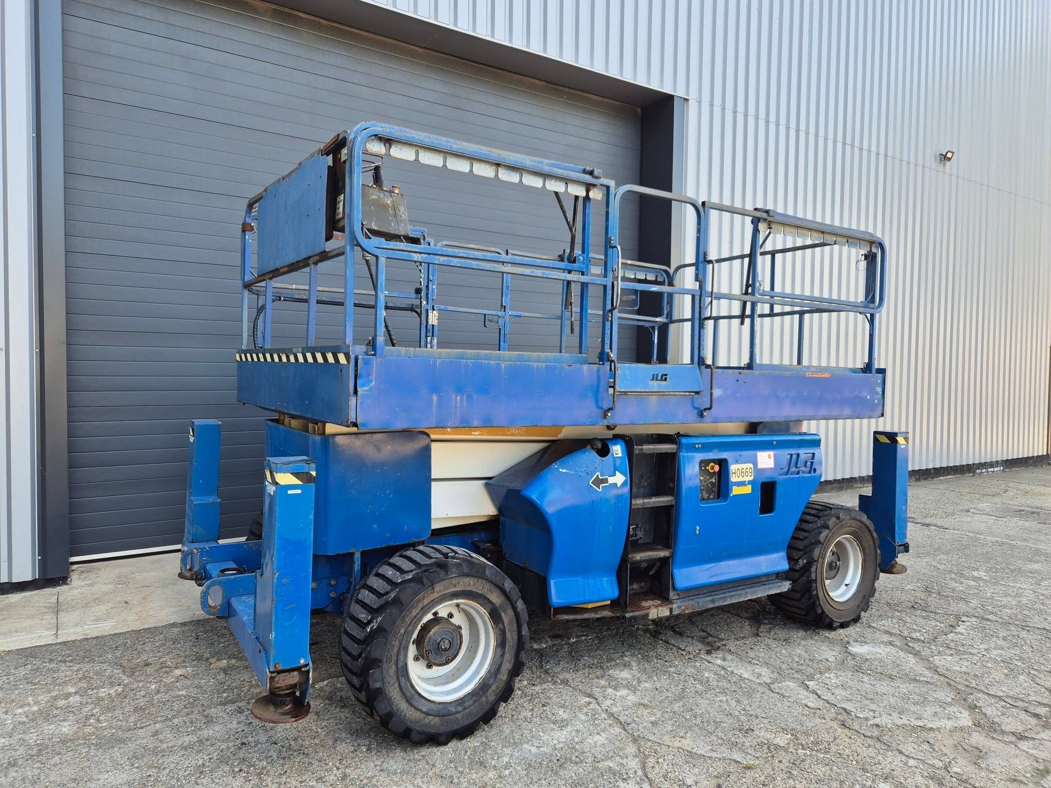 JLG 3394RT 4x4 Ruwterrein schaarlift Hoogwerker, Zakelijke goederen, Machines en Bouw | Liften, Steigers en Ladders