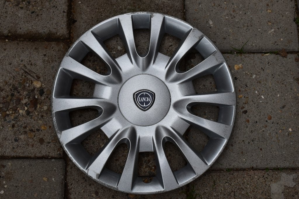1 losse originele wieldop Lancia Delta 16 inch, Ophalen of Verzenden, Gebruikt