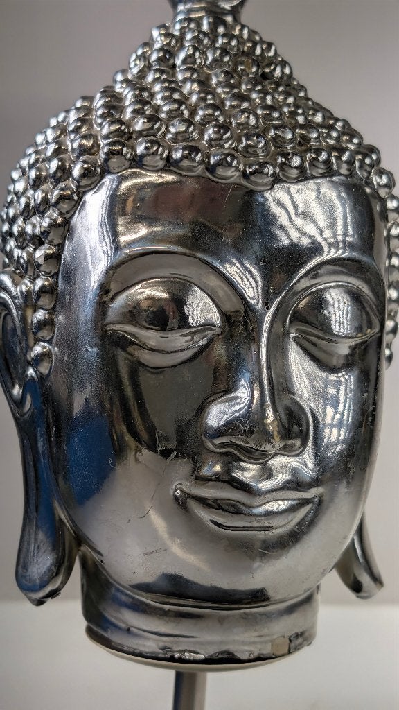 hoofd boeddha, Ophalen