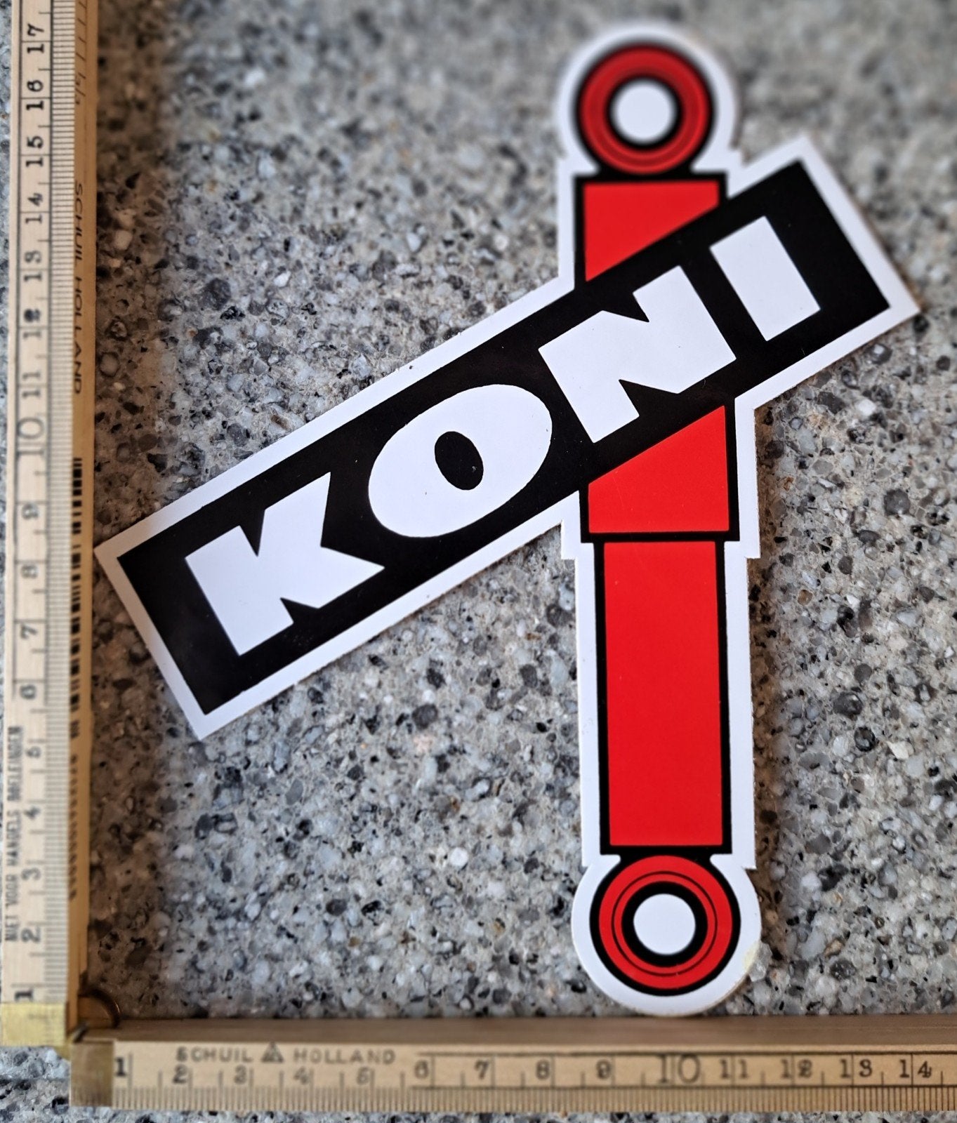 Grote vintage Koni schokbrekers autosport merk logo, Ophalen of Verzenden, Zo goed als nieuw
